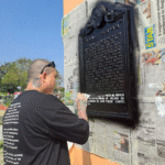 Volunteer groups scrub vandalized Cavite City historical markers clean